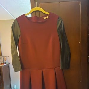Never worn! Cranberry with faux leather sleeves fit and flare dress